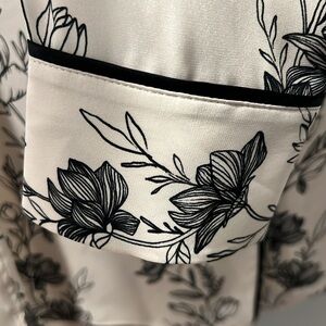 La Ligne NYC 100% Silk gorgeous button up blouse. Beautiful floral design.